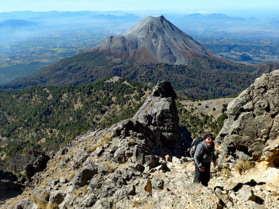 The final part to the summit of Nevado de Colima with the volcano below