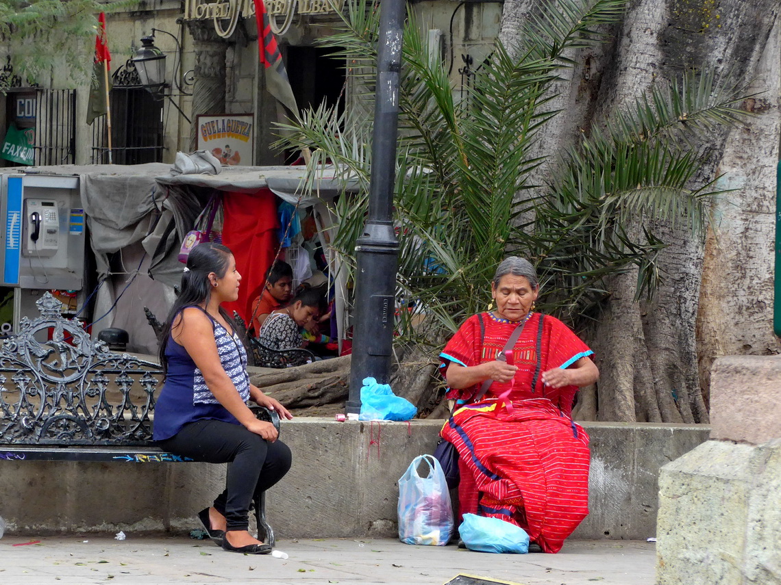 Chatting women on Oaxaca's Zocalo