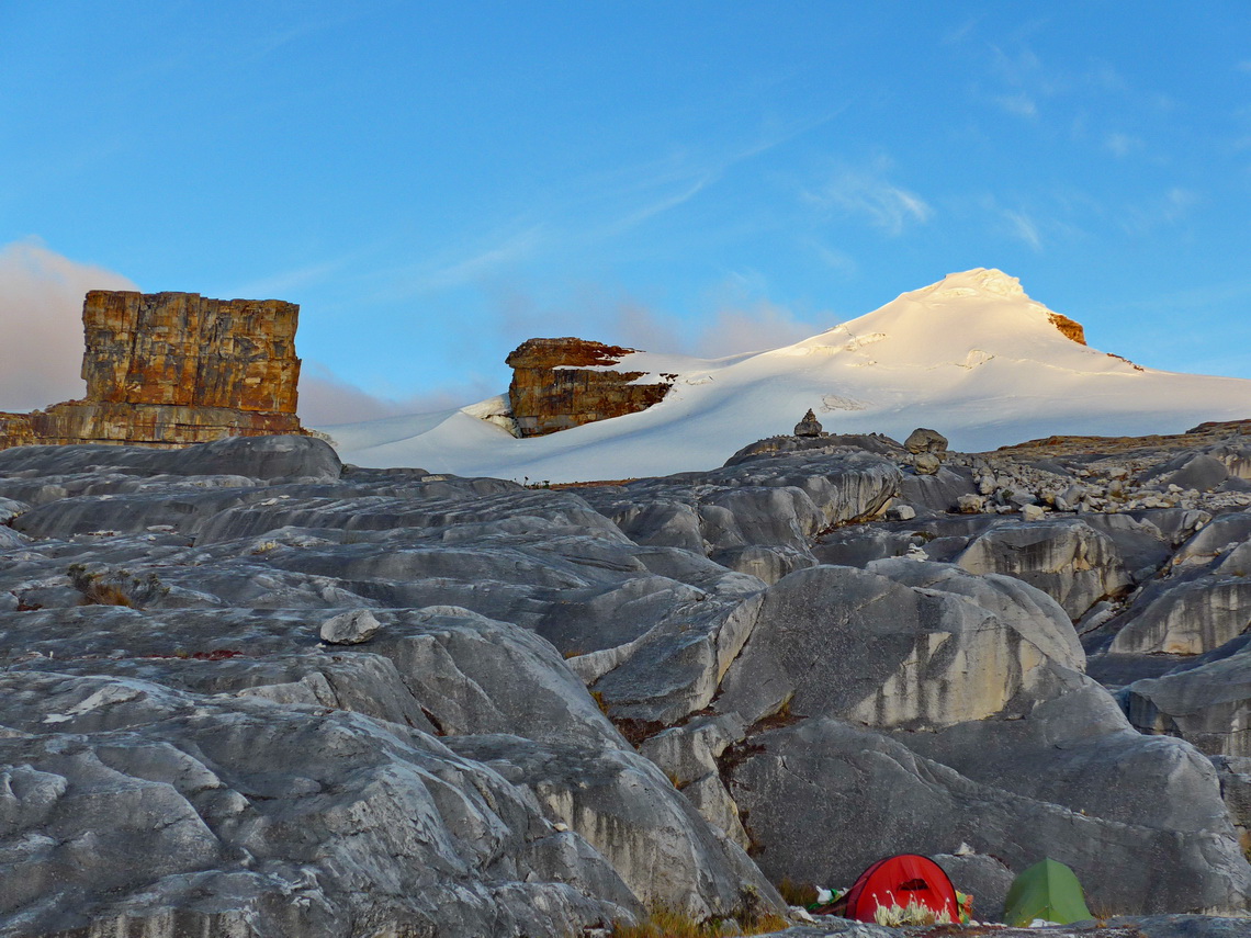 Our high camp with rectangular Púlpito del Diablo and white Pan de Azucar at sunset