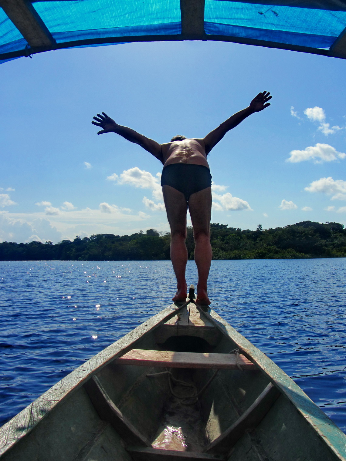 Jumping into the fresh water of Lago Tarapoto