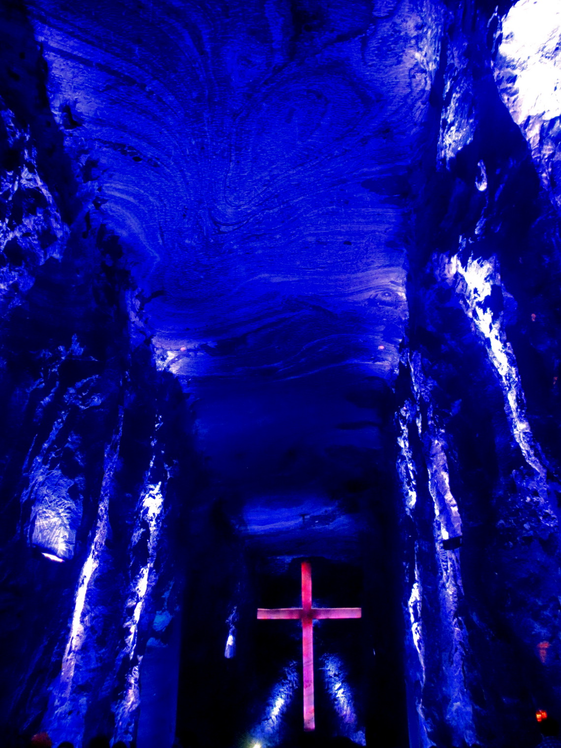75 meters long salt cathedral with its huge cross, illuminated with different colors