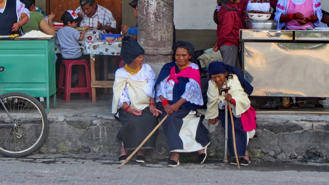Three elderly Ladies on the main square of Cotacachi