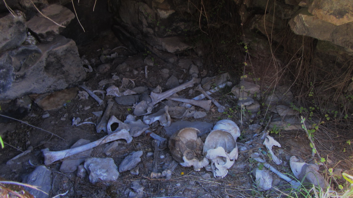 Inca tumbstone with human bones on the way to the forest of stones