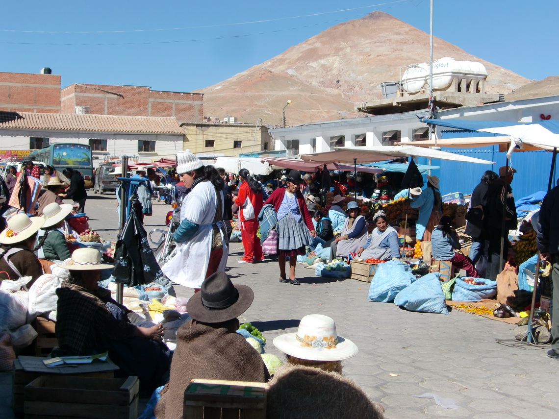 Street market in Potosi with Cerro Rico in the background