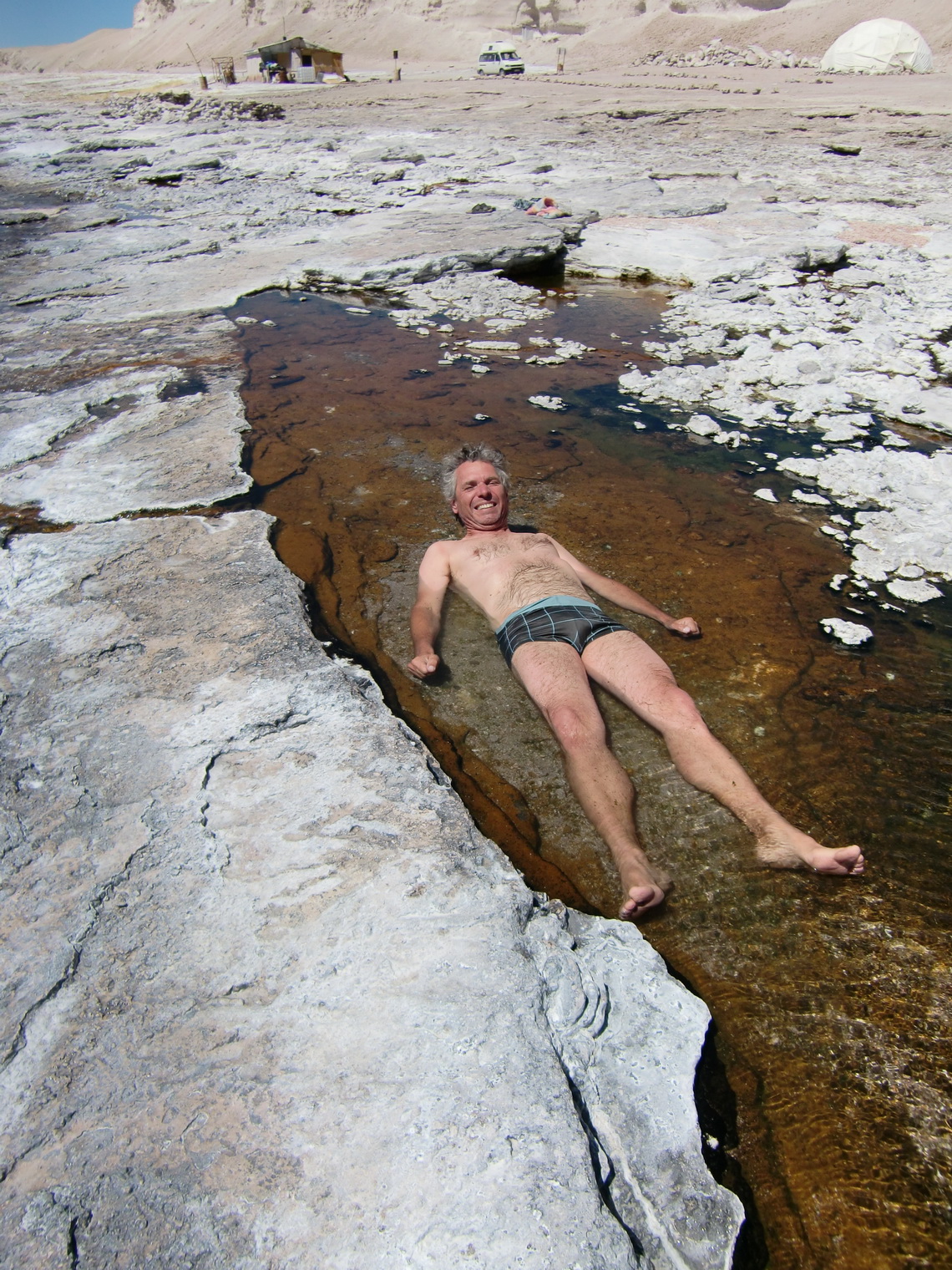 Warming up in the hot springs after the cold swim 